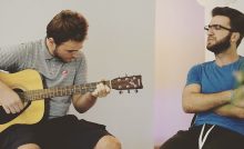 Friend teaching how to play beginner guitar